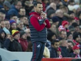 Caretaker manager Leon Britton watches on during the Premier League game between Liverpool and Swansea City on December 26, 2017