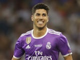 Real Madrid's Marco Asensio celebrates scoring during the Champions League final against Juventus on June 3, 2017