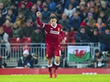 Philippe Coutinho celebrates scoring the opener during the Premier League game between Liverpool and Swansea City on December 26, 2017
