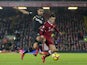 Phillipe Coutinho battles with Kyle Naughton during the Premier League game between Liverpool and Swansea City on December 26, 2017