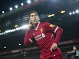 Roberto Firmino celebrates scoring during the Premier League game between Liverpool and Swansea City on December 26, 2017