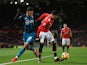 Sofiane Boufal and Jesse Lingard in action during the Premier League game between Manchester United and Southampton on December 30, 2017