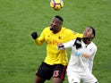 Stefano Okaka and Renato Sanches in action during the Premier League game between Watford and Swansea City on December 30, 2017
