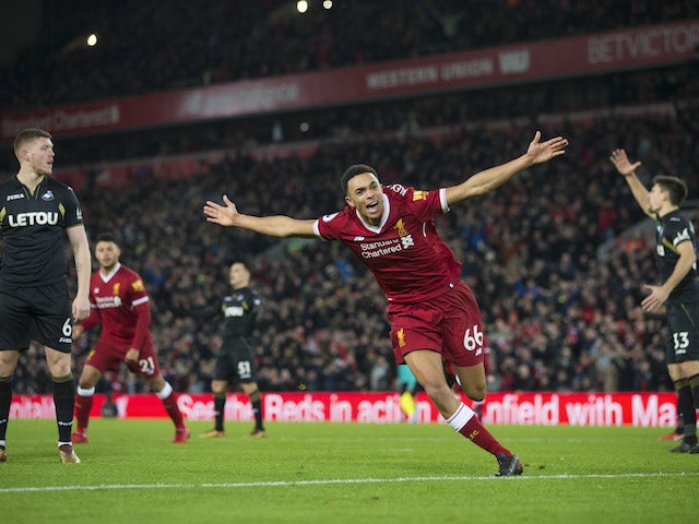 Trent Alexander-Arnold celebrates getting on the scoresheet during the Premier League game between Liverpool and Swansea City on December 26, 2017