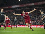 Trent Alexander-Arnold celebrates getting on the scoresheet during the Premier League game between Liverpool and Swansea City on December 26, 2017