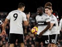Aboubakar Kamara argues with Fulham teammate Aleksandar Mitrovic on December 29, 2018
