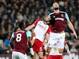 Andy Carroll and Claudio Yacob in action during the Premier League game between West Ham United and West Bromwich Albion on January 2, 2018