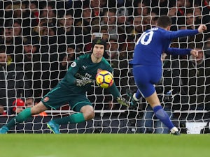 Eden Hazard scores from the spot past Petr Cech during the Premier League game between Arsenal and Chelsea on January 3, 2018