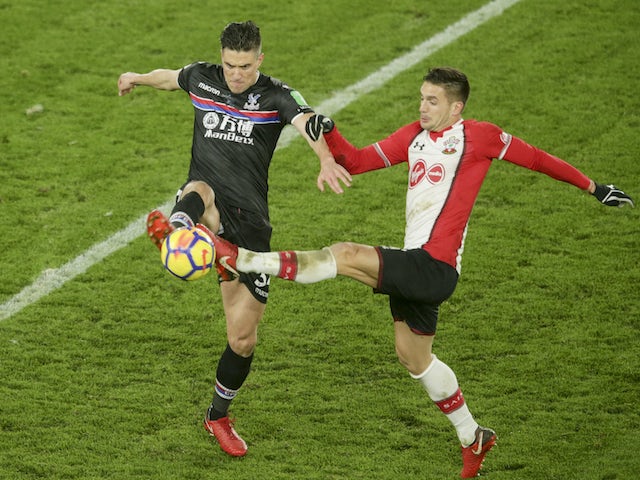 Martin Kelly and Dusan Tadic in action during the Premier League game between Southampton and Crystal Palace on January 2, 2018