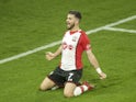 Shane Long celebrates opening the scoring during the Premier League game between Southampton and Crystal Palace on January 2, 2018