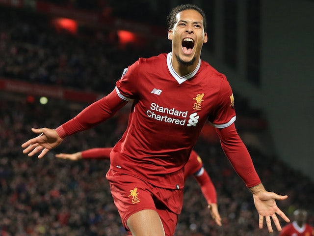 Virgil van Dijk celebrates after quite literally leaping like a salmon to score the Reds' second during the FA Cup game between Liverpool and Everton on January 5, 2018
