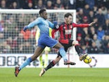 Danny Welbeck and Adam Smith in action during the Premier League game between Bournemouth and Arsenal on January 14, 2018