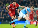 Dejan Lovren and Kevin De Bruyne in action during the Premier League game between Liverpool and Manchester City on January 14, 2018