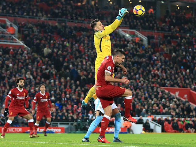 Ederson punches clear during the Premier League game between Liverpool and Manchester City on January 14, 2018
