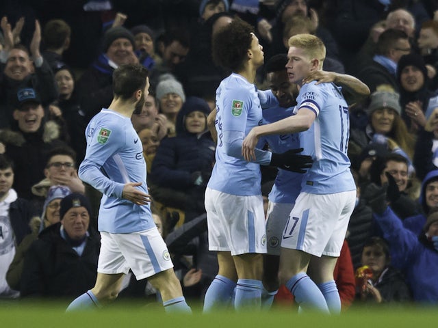 Kevin De Bruyne celebrates with teammates after scoring an equaliser during the EFL Cup game between Manchester City and Bristol City on January 9, 2018