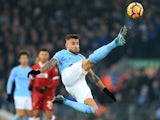 Nicolas Otamendi in acrobatic action during the Premier League game between Liverpool and Manchester City on January 14, 2018
