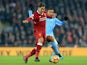 Roberto Firmino and Danilo in action during the Premier League game between Liverpool and Manchester City on January 14, 2018