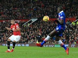 Anthony Martial fires past Kurt Zouma for the second during the Premier League game between Manchester United and Stoke City on January 15, 2018