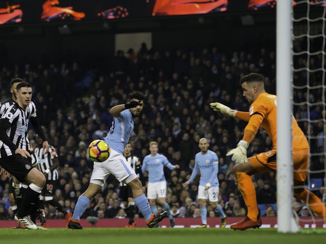 Sergio Aguero scores during the Premier League game between Manchester City and Newcastle United on January 20, 2018