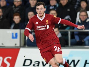 Robertson 'chased down ball boy' for match ball