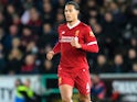 Virgil van Dijk in action during the Premier League game between Swansea City and Liverpool on January 22, 2018