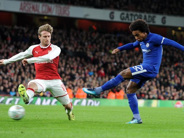 Chelsea winger Willian shoots at goal during his side's EFL Cup semi-final with Arsenal at the Emirates Stadium on January 24, 2018