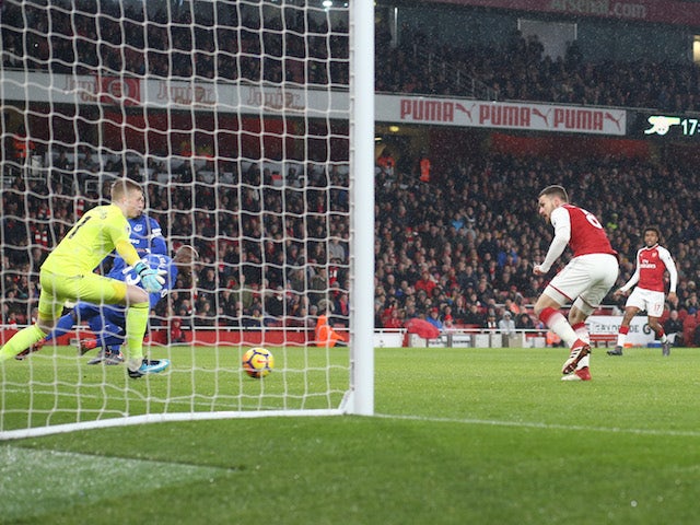 Aaron Ramsey scores the opener during the Premier League game between Arsenal and Everton on February 3, 2018