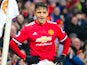 Alexis Sanchez of Manchester United prepares to take a corner during the Premier League match against Huddersfield Town on February 3, 2018