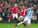 Alexis Sanchez and Tommy Smith during the Premier League match between Manchester United and Huddersfield Town on February 3, 2018
