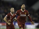 Emre Can celebrates scoring during the Premier League game between Huddersfield Town and Liverpool on January 30, 2018