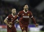 Emre Can celebrates scoring during the Premier League game between Huddersfield Town and Liverpool on January 30, 2018