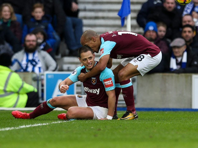 Javier Hernandez scores the equaliser during the Premier League match between Brighton & Hove Albion and West Ham United on February 3, 2018