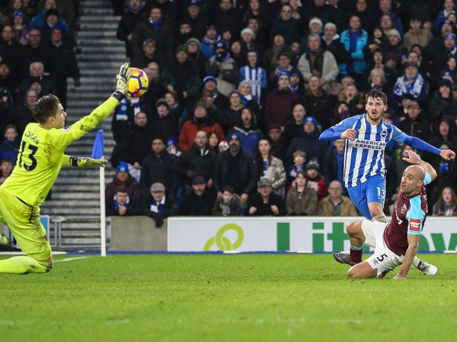 Adrian saves a shot from Pascal Gross during the Premier League match between Brighton & Hove Albion and West Ham United on February 3, 2018