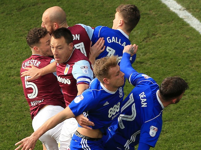 John Terry among a group of players during the Championship game between Aston Villa and Birmingham City on February 11, 2018