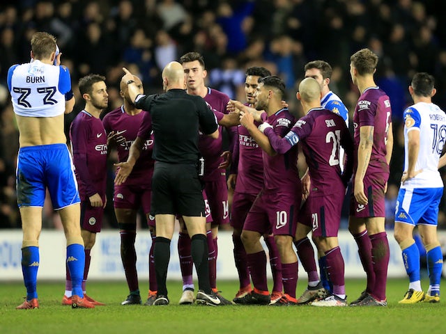 FA charges Wigan, Manchester City