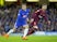 Eden Hazard and Gerard Pique in action during the Champions League group game between Chelsea and Barcelona on February 20, 2018