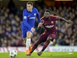 Eden Hazard and Samuel Umtiti in action during the Champions League group game between Chelsea and Barcelona on February 20, 2018