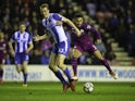 Ilkay Gundogan and Dan Burn in action during the FA Cup game between Wigan Athletic and Manchester City on February 19, 2018