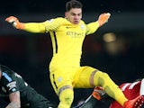 Ederson in action during the Premier League game between Arsenal and Manchester City on March 1, 2018