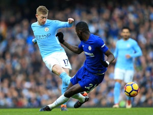 Kevin De Bruyne takes on Antonio Rudiger during the Premier League game between Manchester City and Chelsea on March 4, 2018