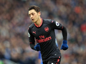 Mesut Ozil in action during the Premier League game between Brighton & Hove Albion and Arsenal on March 4, 2018