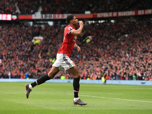 Marcus Rashford celbrates scoring the opener during the Premier League game between Manchester United and Liverpool on March 10, 2018
