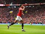 Marcus Rashford celbrates scoring the opener during the Premier League game between Manchester United and Liverpool on March 10, 2018