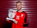Oli McBurnie of Barnsley poses with his Championship player of the month award for February 2018