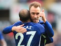 Christian Eriksen celebrates with Lucas Moura after scoring during the FA Cup quarter-final between Swansea City and Tottenham Hotspur on March 17, 2018