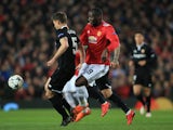 Clement Lenglet and Romelu Lukaku in action during the Champions League round-of-16 game between Manchester United and Sevilla on March 13, 2018