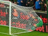 Ederson ends up in the back of the net during the Premier League game between Stoke City and Manchester City on March 12, 2018