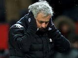 Jose Mourinho covers his ears during the FA Cup quarter-final between Manchester United and Brighton & Hove Albion on March 17, 2018