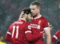 Mohamed Salah is embraced by Jordan Henderson during the Premier League game between Liverpool and Watford on March 17, 2018