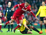 Richarlison and Joe Gomez in action during the Premier League game between Liverpool and Watford on March 17, 2018